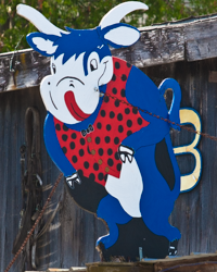 A blue ox sign stretches boldly and proudly from the front of a Door County, WI, restaurant.