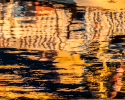 Watery reflections create a luminous abstract painting.