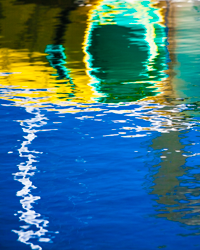 Watery reflections create a jeweled composition in citrine, emerald, and sapphire.